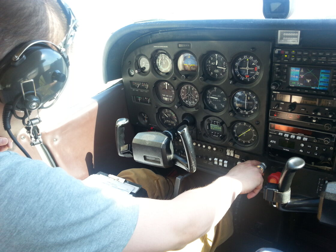 Paulo at the instrument panel
